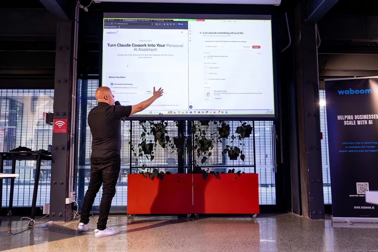 Leo presenting at a Waboom AI Claude Code workshop, showing Claude Cowork being turned into a personal AI assistant on the big screen behind him