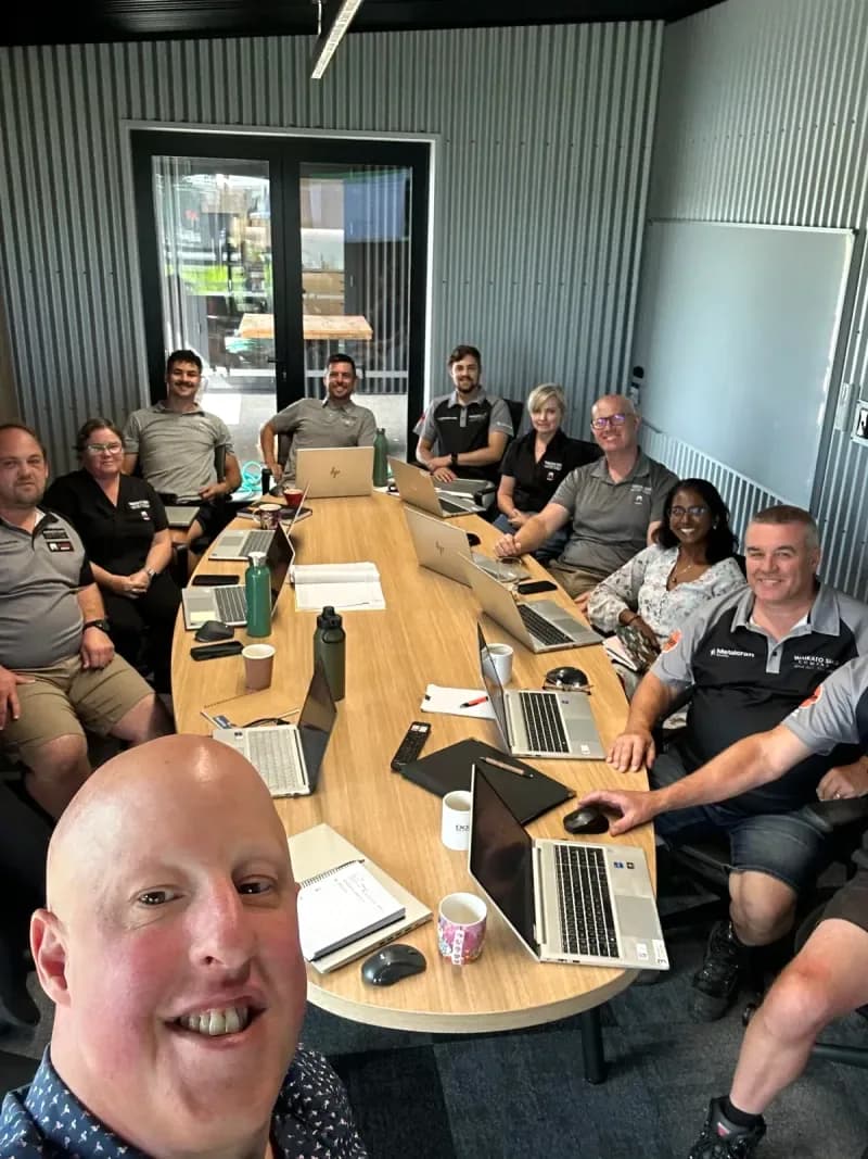 Leo running a private onsite AI training session for a company team