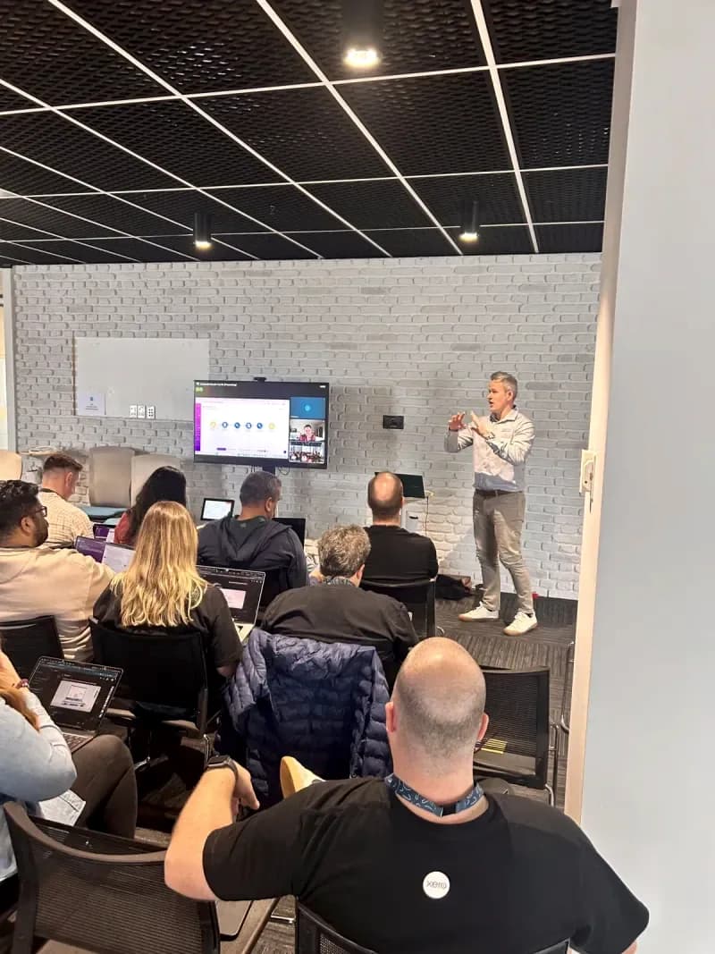 A Waboom trainer presenting at a hands-on AI workshop