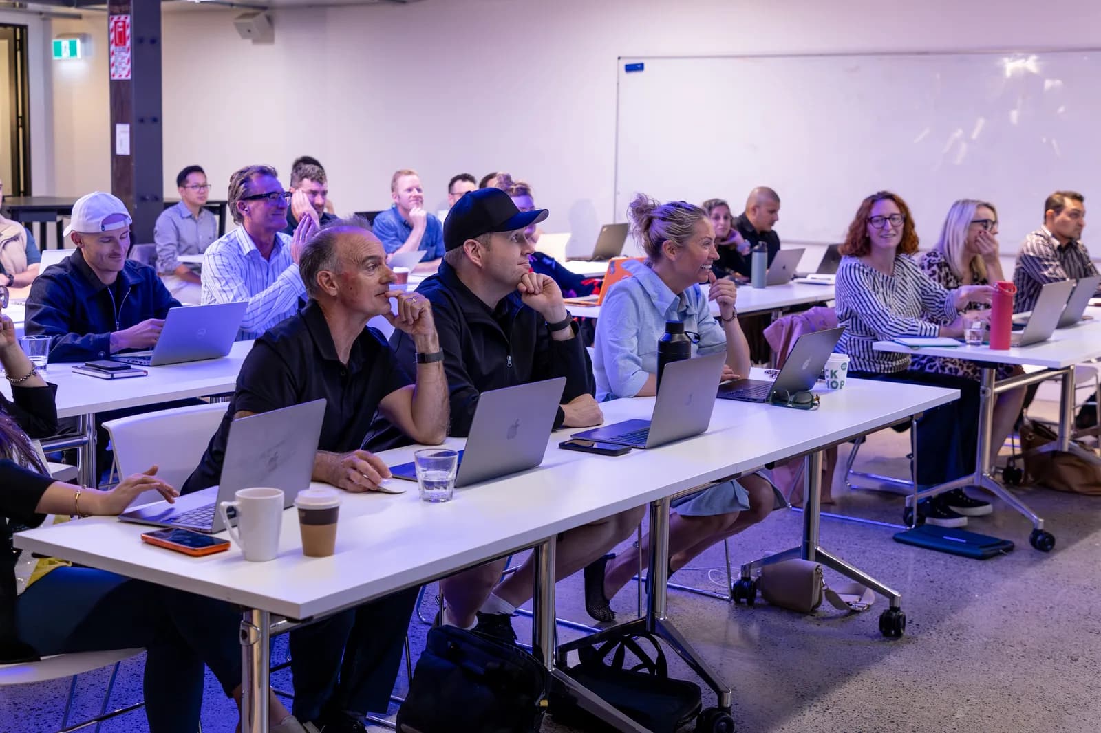 Attendees building their AI sales agents at a Waboom AI workshop